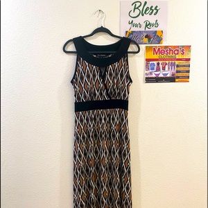 Ellie McCarthey Long Sleeveless Dress